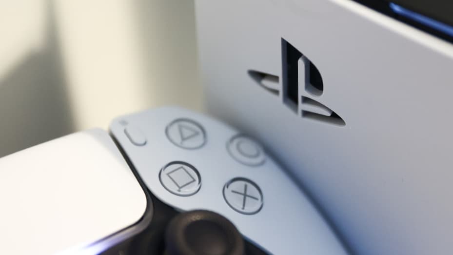 PlayStation DualSense controller and PlayStation 5 console are seen in this illustration photo taken in Krakow, Poland on April 9, 2022.