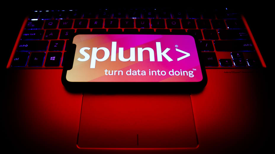 Splunk logo displayed on a phone screen and a laptop keyboard are seen in this illustration photo taken in Krakow, Poland on October 30, 2021. (Photo by Jakub Porzycki/NurPhoto via Getty Images)